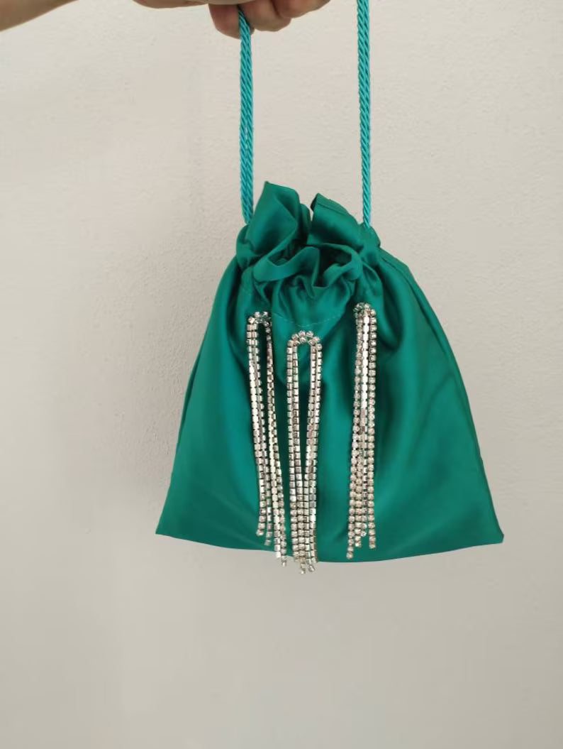 Pouch bag with diamond application
