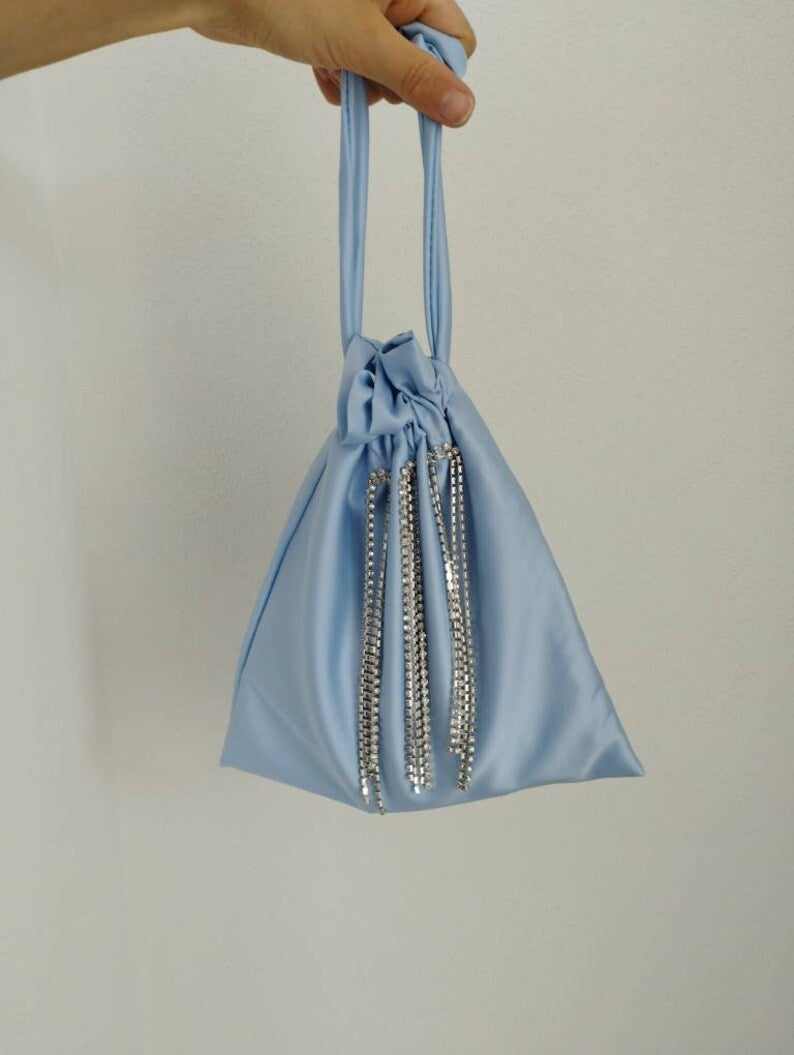Pouch bag with diamond application