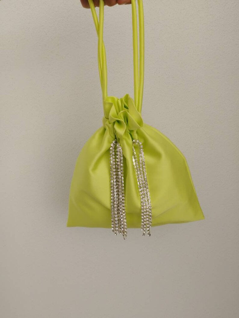 Pouch bag with diamond application